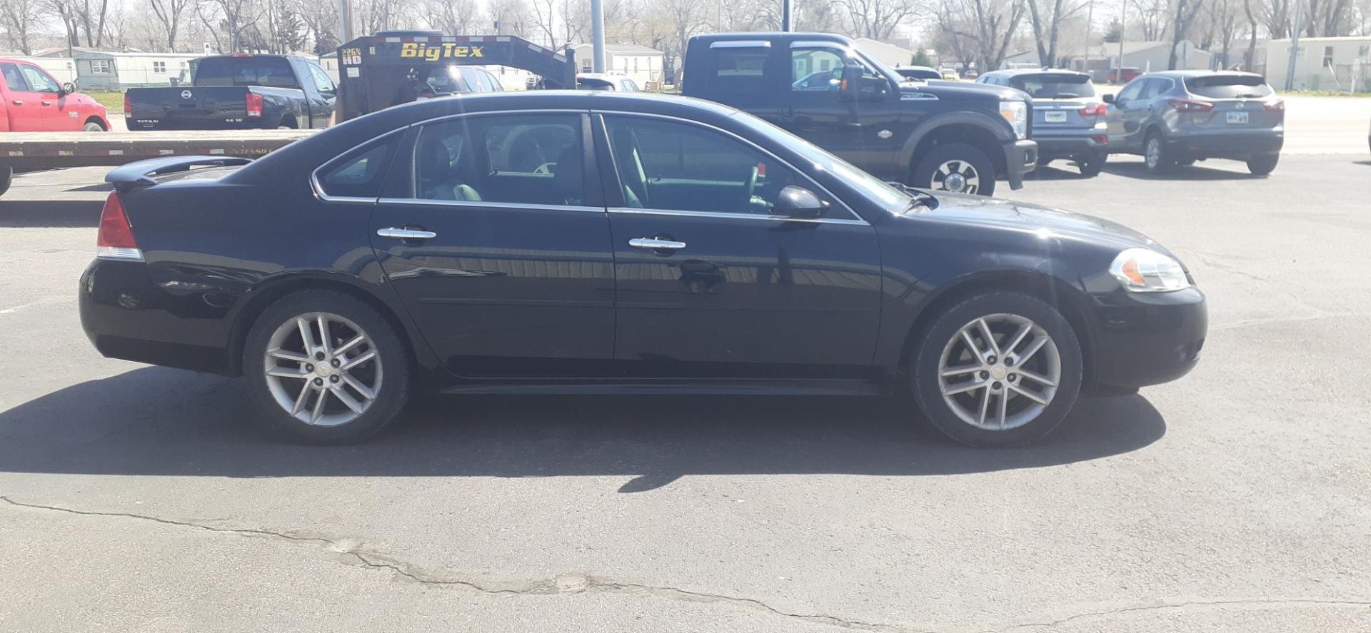 2016 Chevrolet Impala Limited LTZ (2G1WC5E3XG1) with an 3.6L V6 DOHC 16V FFV engine, 6A transmission, located at 2015 Cambell Street, Rapid City, SD, 57701, (605) 342-8326, 44.066433, -103.191772 - CARFAX AVAILABLE - Photo#4